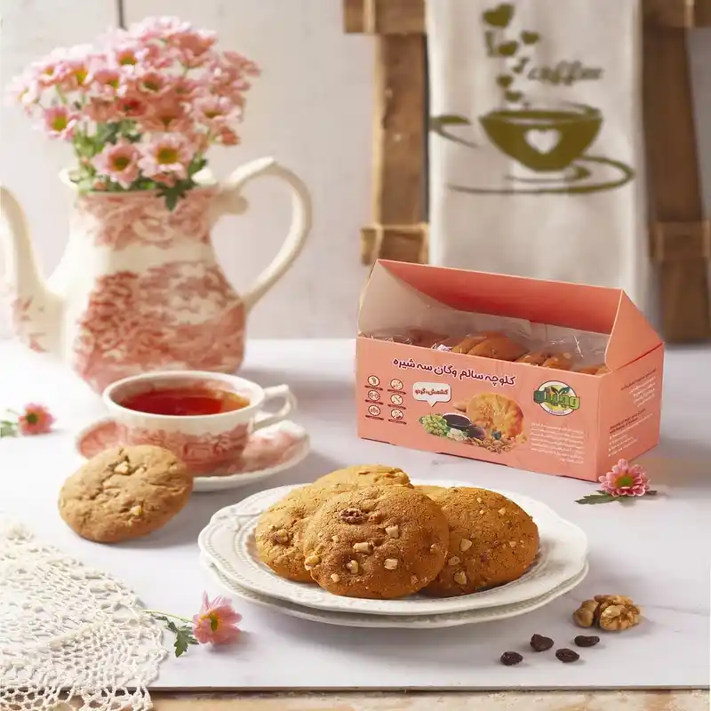 کلوچه سالم سه‌ شیره کشمش‌ گردو وگان - 300 گرم برند اکسیراژل